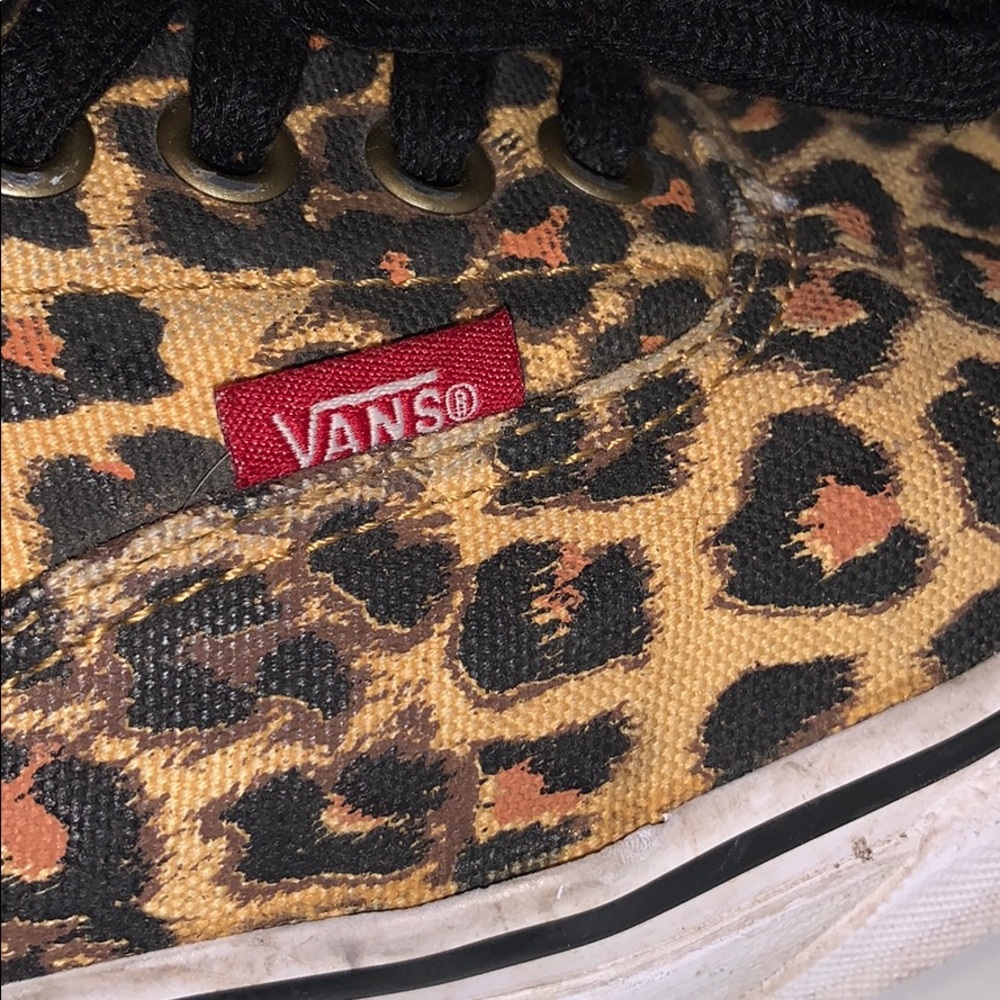 white sneakers with cheetah print back